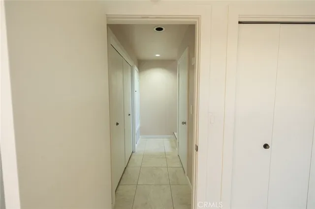 a view of a road with a cars park