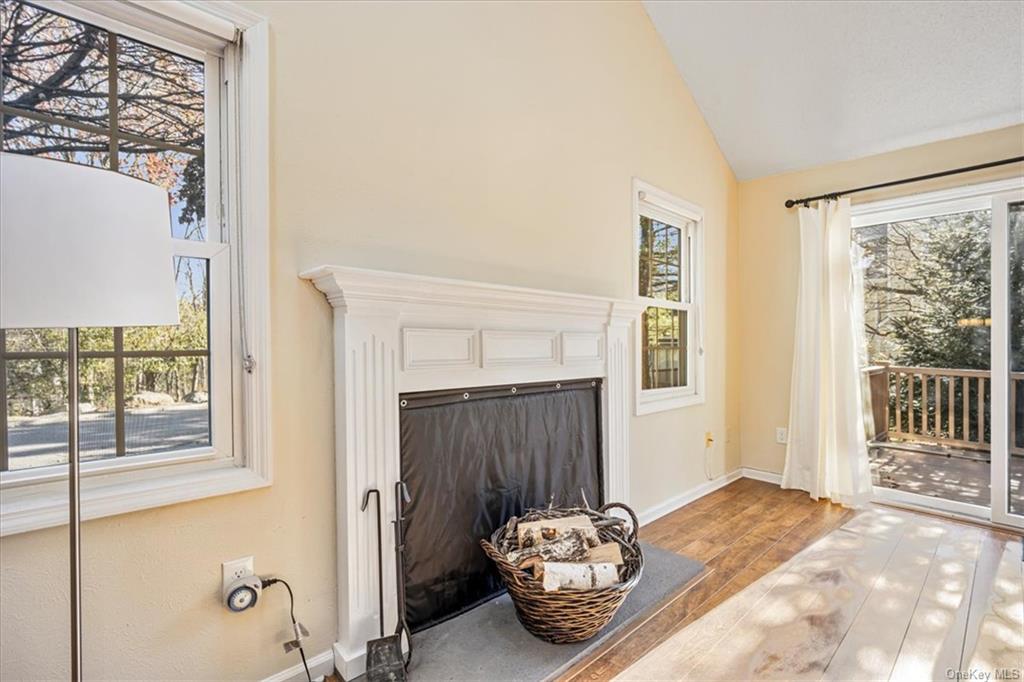 1 Chadwick Court Fishkill, NY 12524 - Photo 14 of 35 Unfurnished living room with lofted ceiling and light hardwood / wood-style flooring