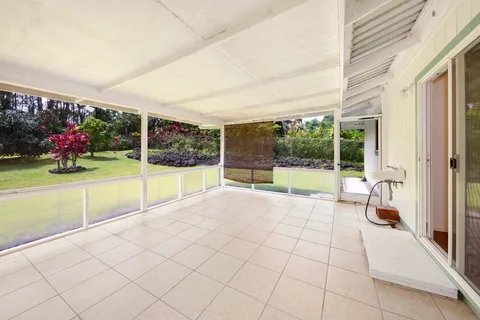 a view of a room with window and an outdoor view
