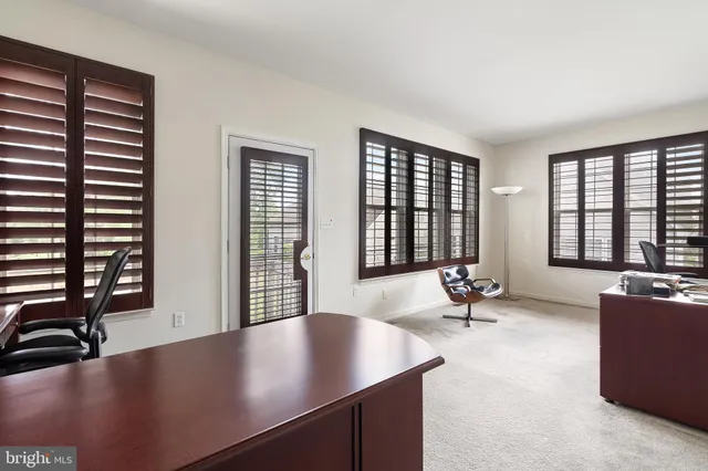 a room with furniture and a window