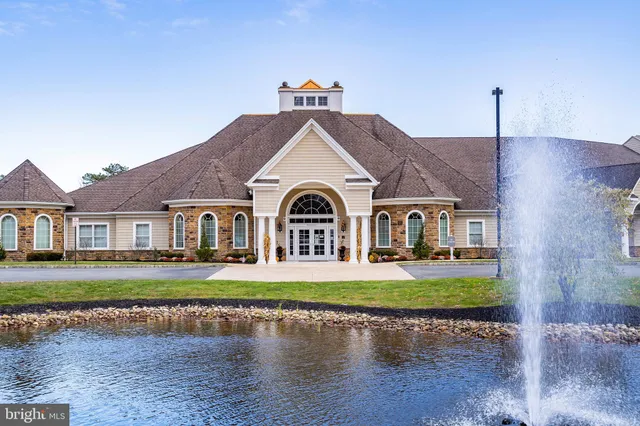 a view of a living room and dining room