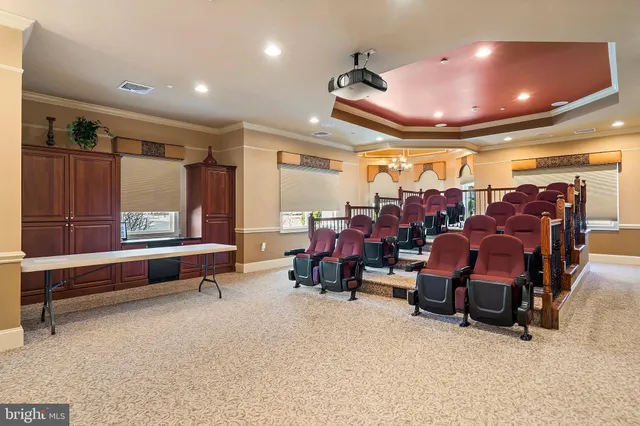 a group of people sitting at tables in a room