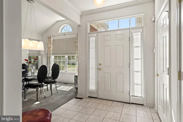a view of a livingroom with furniture and a window