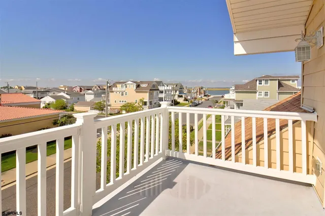 a view of a balcony with city view