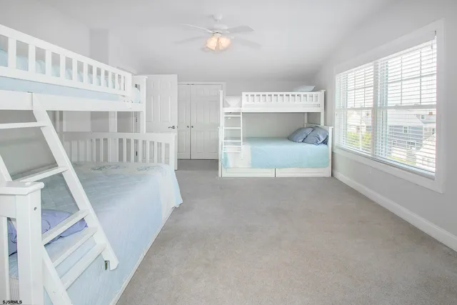 a view of an empty room with a fireplace