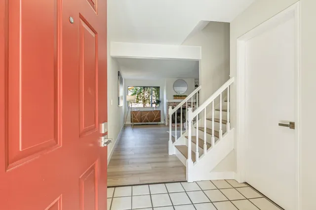 a view interior of a house with wooden floor windows and entryway