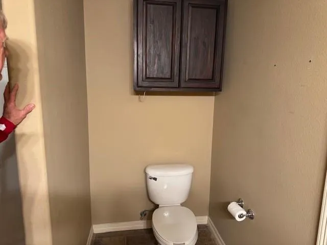 a bathroom with a toilet