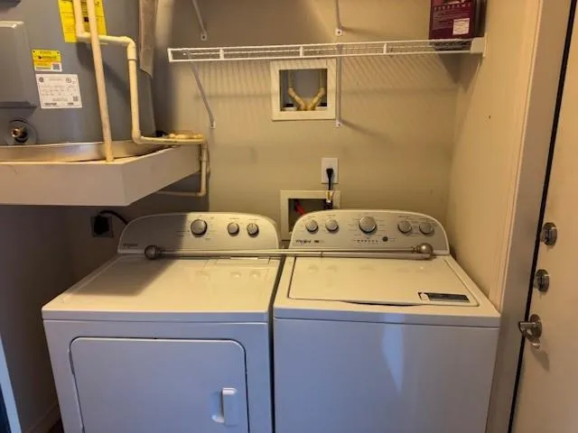 a utility room with dryer and washer