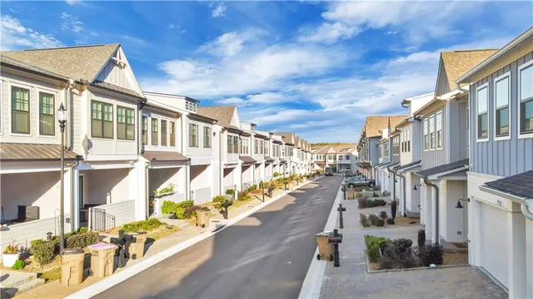 a city street lined with tall buildings