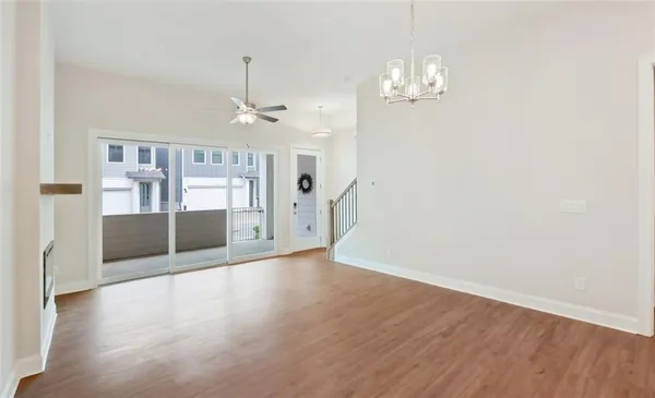 a kitchen with stainless steel appliances a refrigerator sink and stove