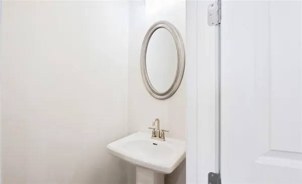 a view of a hallway with washer and dryer