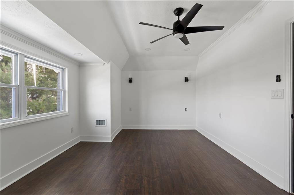 1105 Portland Street Pittsburgh, PA 15206 - Photo 40 of 48 wooden floor in an empty room with a window