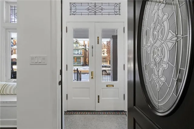 a view of entryway with wooden floor