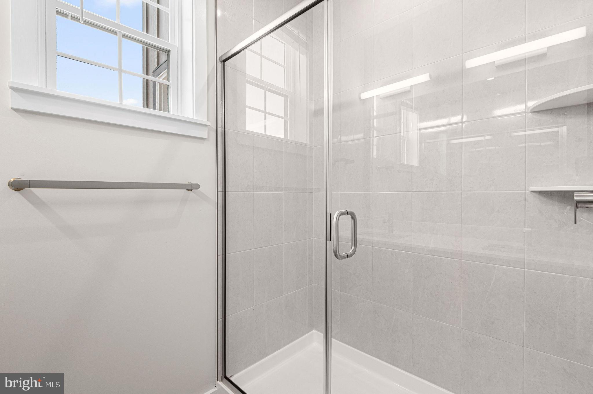 26 South York Road, Unit 410 Hatboro, PA 19040 - Photo 18 of 22 a bathroom with a shower