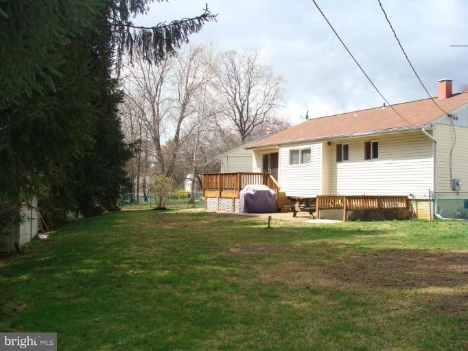 307 Bryanstone Road Reisterstown, MD 21136 - Photo 3 of 25 a view of a house with a yard