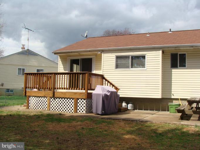 307 Bryanstone Road Reisterstown, MD 21136 - Photo 5 of 25 a view of a house with a patio