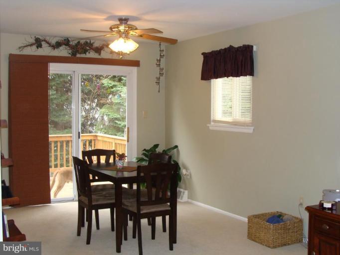 307 Bryanstone Road Reisterstown, MD 21136 - Photo 9 of 25 a dining room with furniture and window
