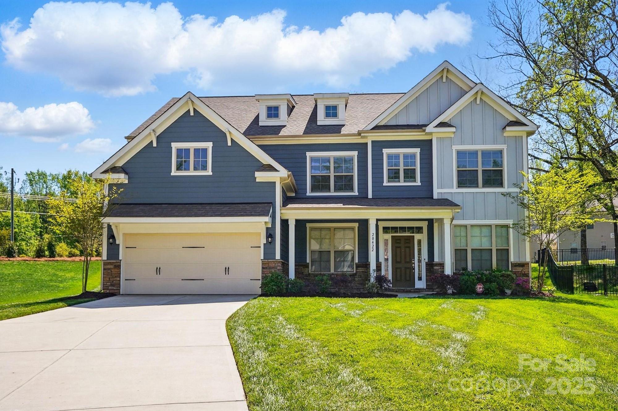 20422 Creek Bend Edge Court Matthews, NC 28105 - Photo 1 of 39 a front view of a house with garden