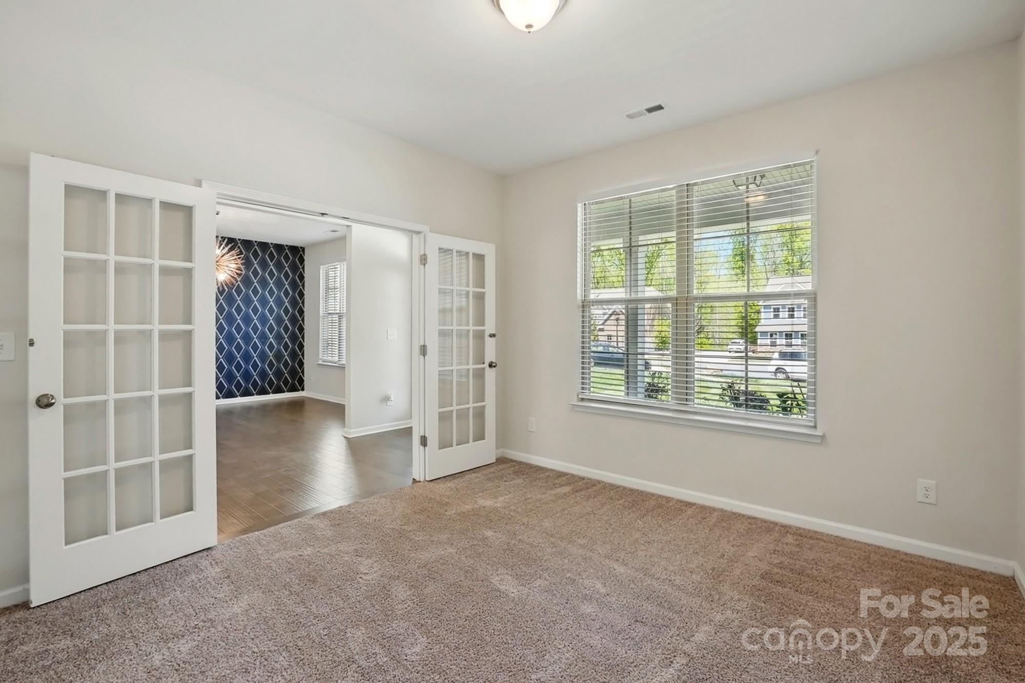 20422 Creek Bend Edge Court Matthews, NC 28105 - Photo 13 of 39 a view of an empty room with a window