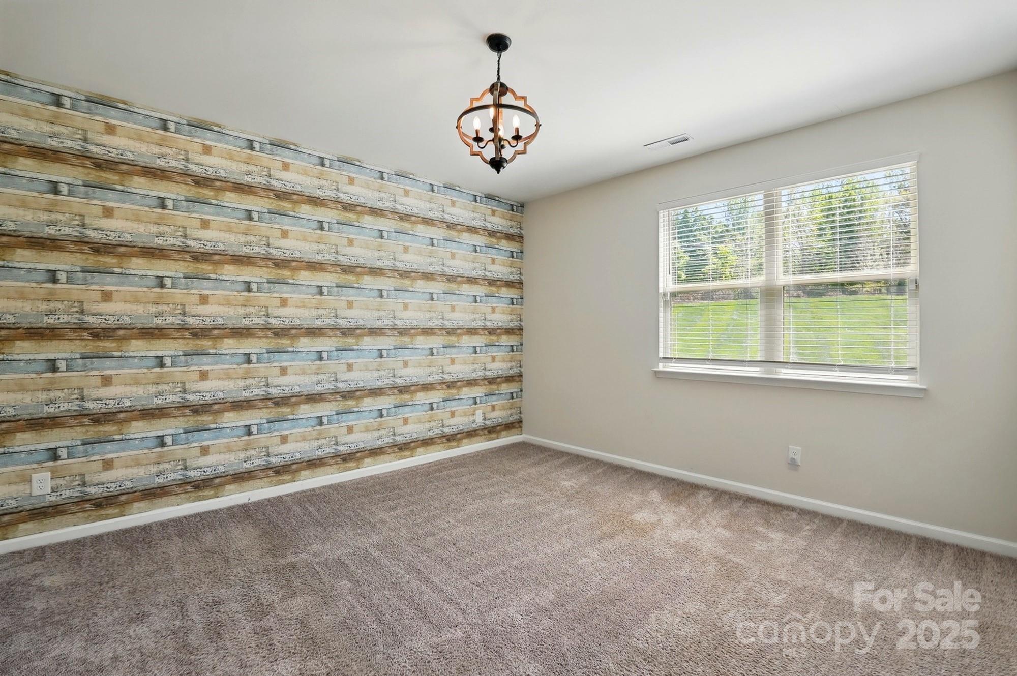 20422 Creek Bend Edge Court Matthews, NC 28105 - Photo 14 of 39 a view of an empty room with a window