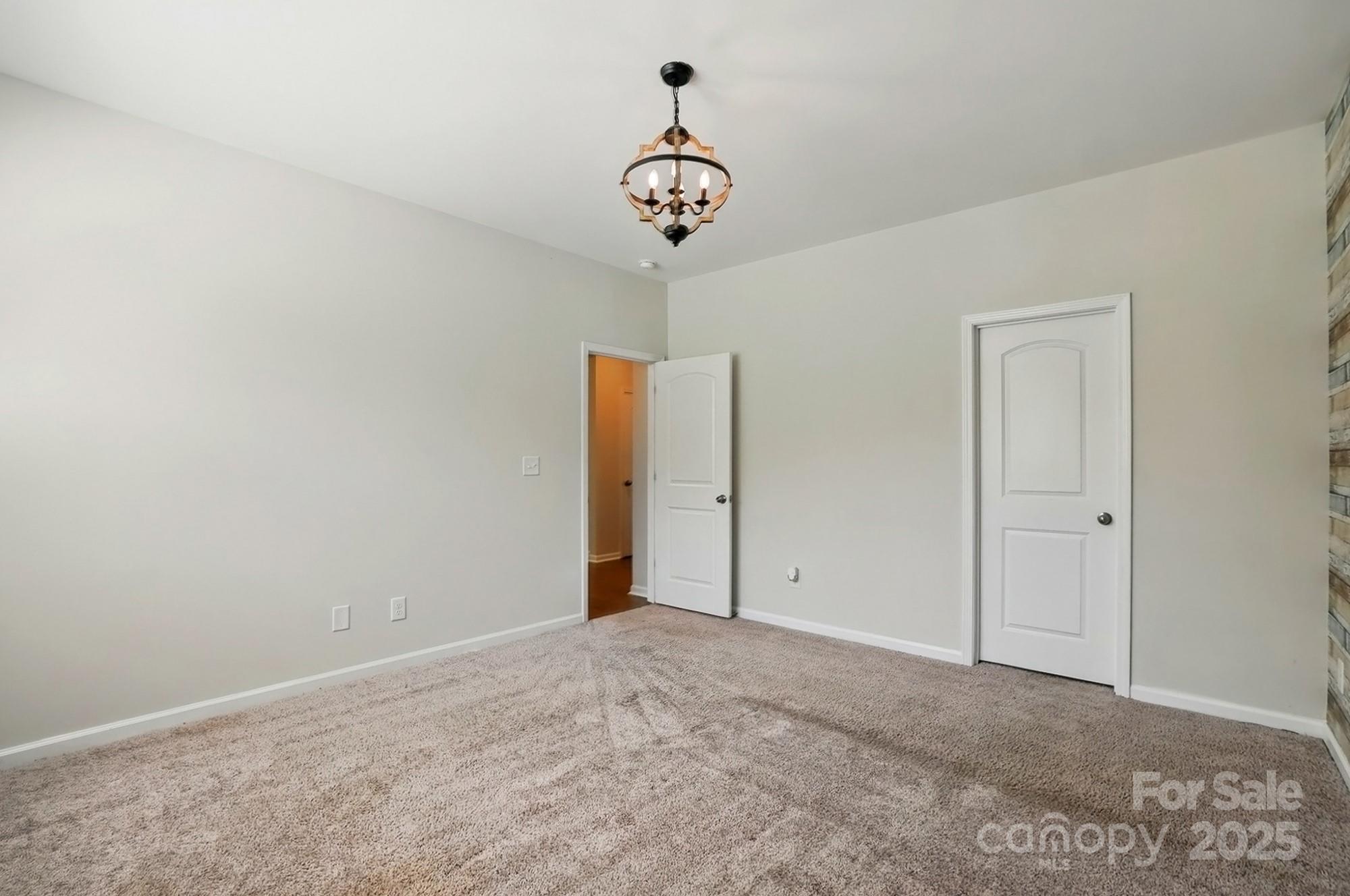 20422 Creek Bend Edge Court Matthews, NC 28105 - Photo 15 of 39 a view of a chandelier fan in a room