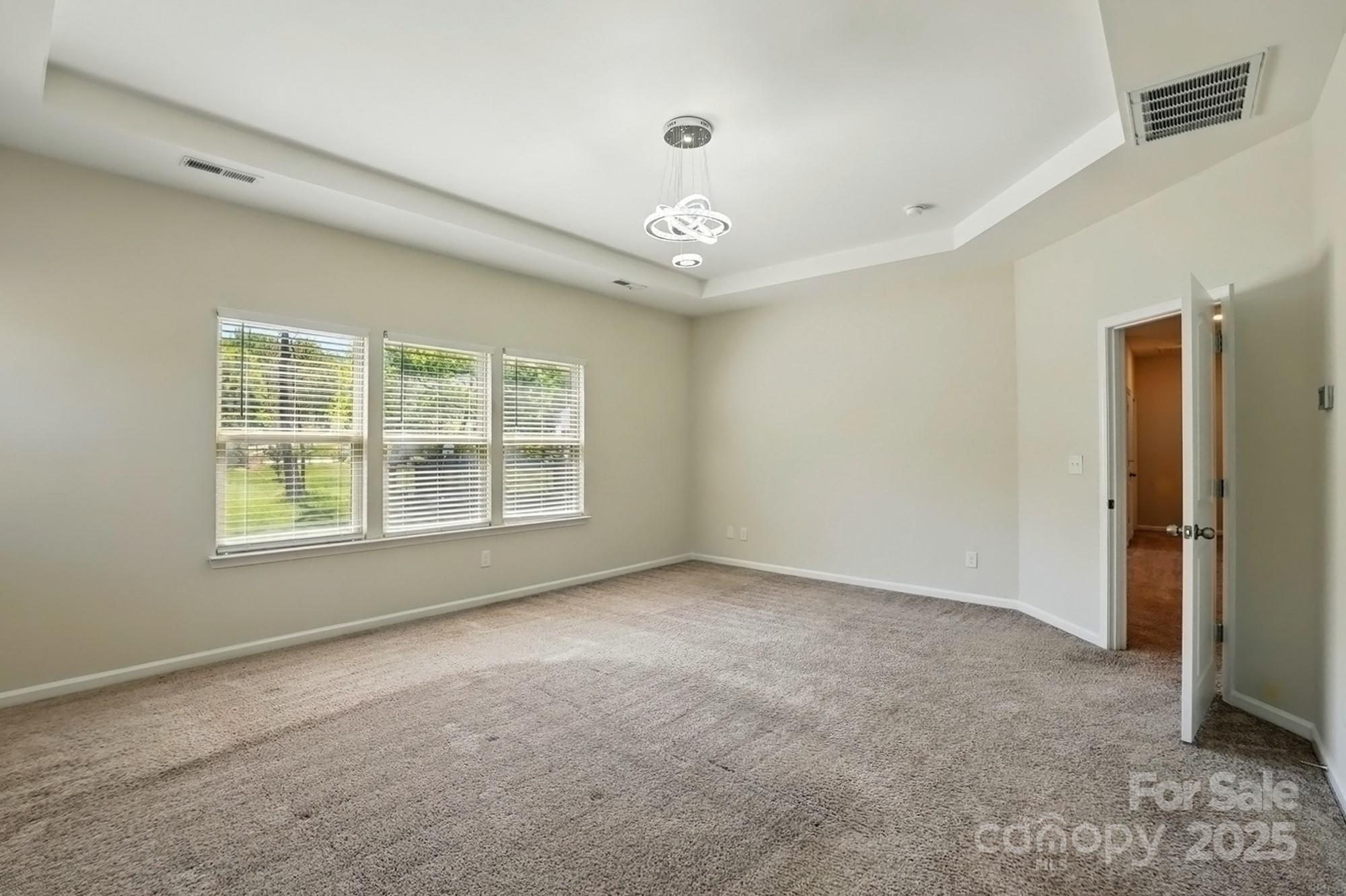 20422 Creek Bend Edge Court Matthews, NC 28105 - Photo 18 of 39 a view of an empty room with a window