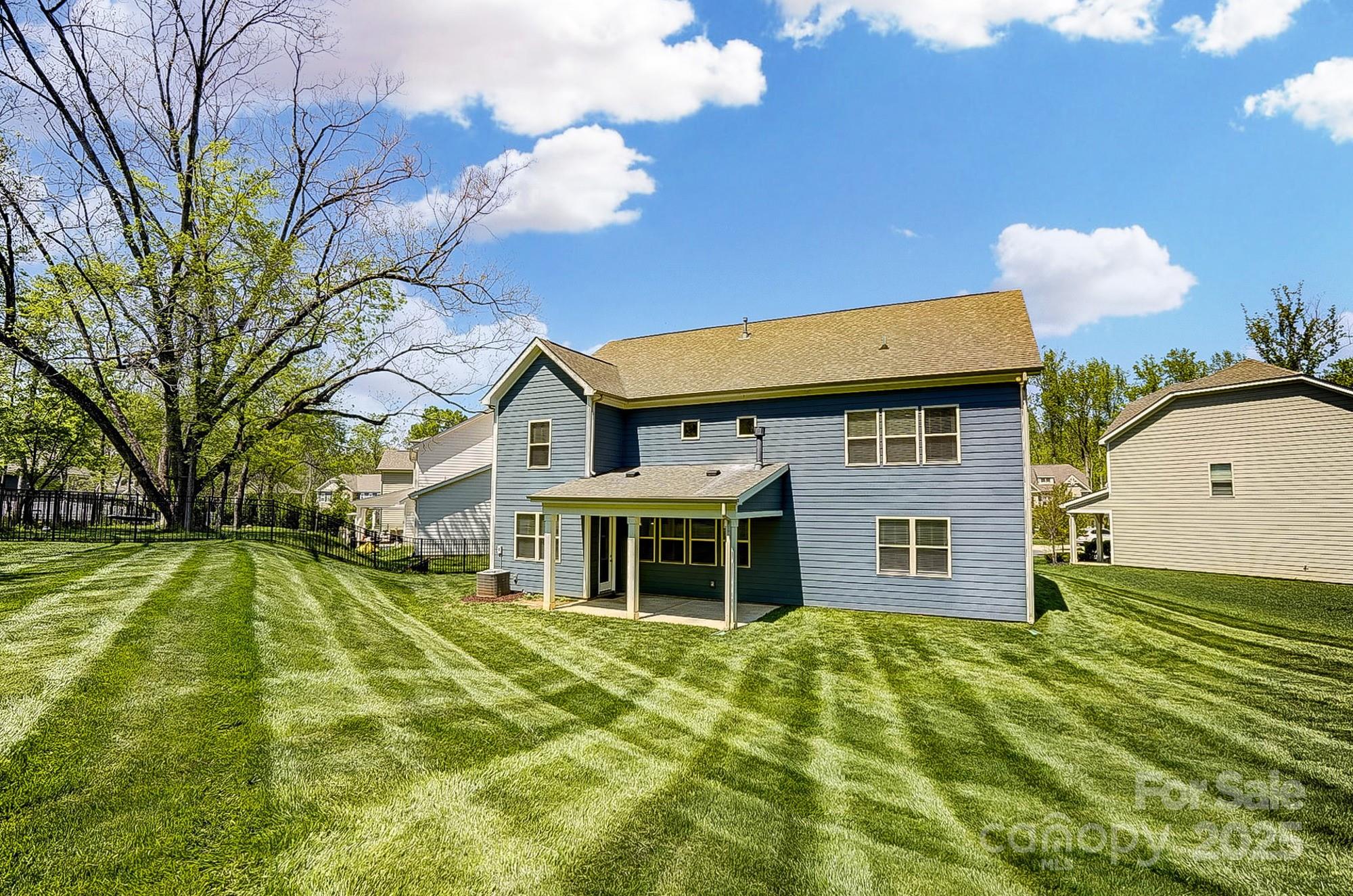 20422 Creek Bend Edge Court Matthews, NC 28105 - Photo 37 of 39 a front view of a house with a yard