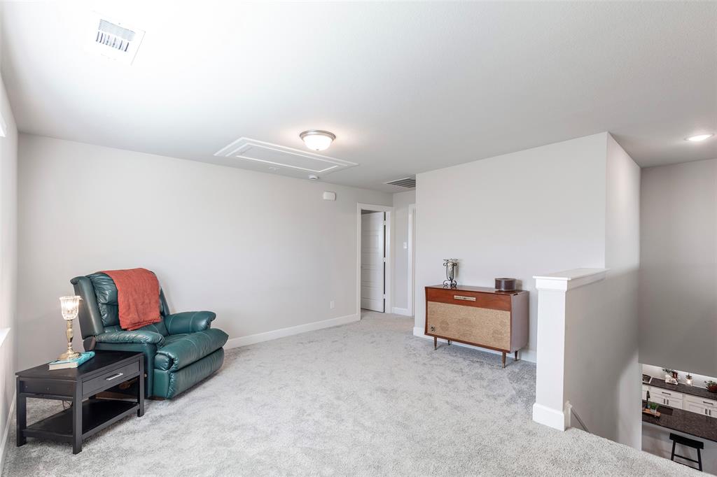 905 Bent Brook Road Little Elm, TX 75068 - Photo 24 of 40 a room with furniture