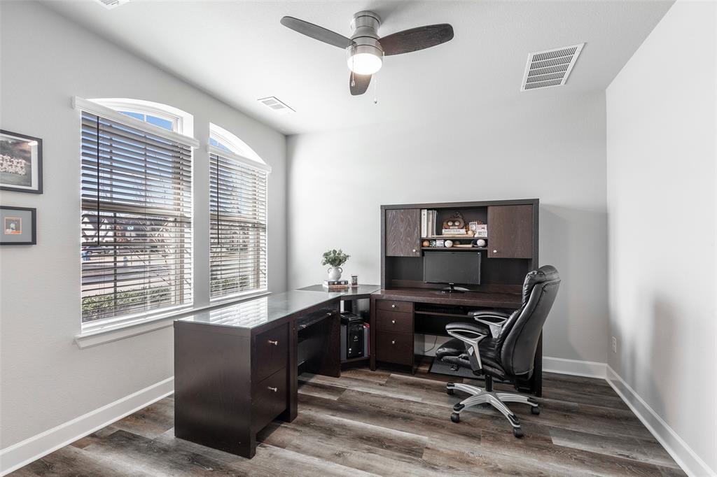 905 Bent Brook Road Little Elm, TX 75068 - Photo 7 of 40 a view of a workspace with furniture and a window