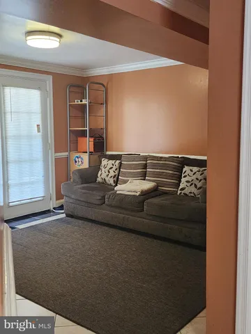 a view of a livingroom with furniture