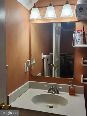 a bathroom with a sink and a toilet