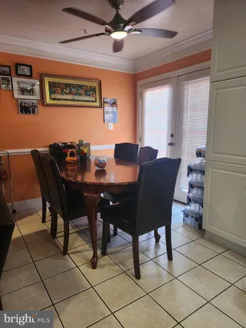a kitchen with stainless steel appliances a refrigerator and a stove top oven