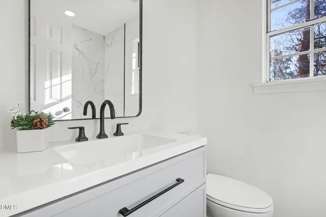 an empty room with a empty space and window