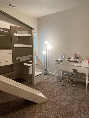 a bathroom with a granite countertop toilet a sink and bathtub