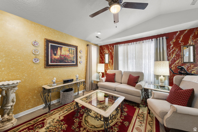 1225 North Dixie Downs Road, Unit 161 St. George, UT 84770 - Photo 3 of 21 Living space featuring a vaulted ceiling with a ceiling fan