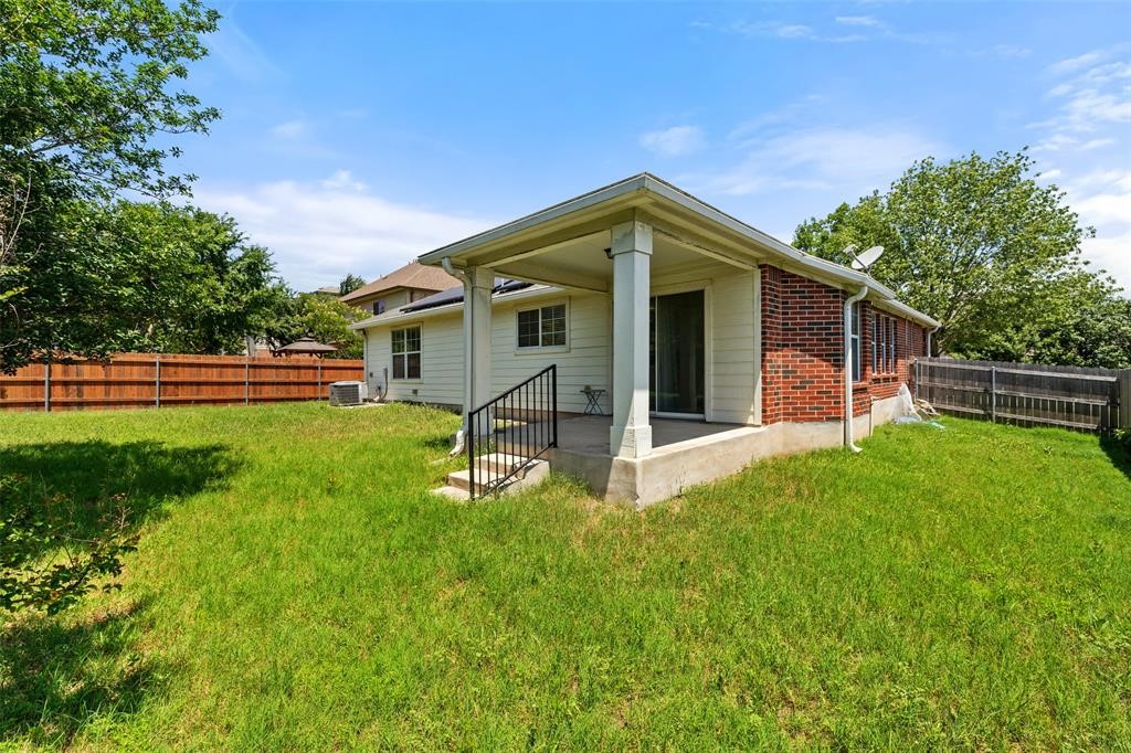 517 Castebar Drive Round Rock, TX 78664 - Photo 28 of 37 a view of a house with a yard