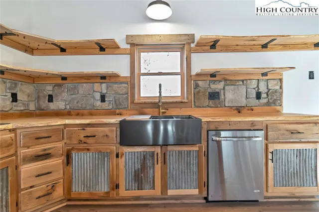 a view of a living room and entryway