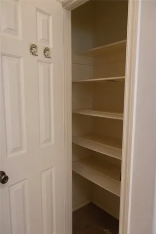 a view of a room with rack on the wall