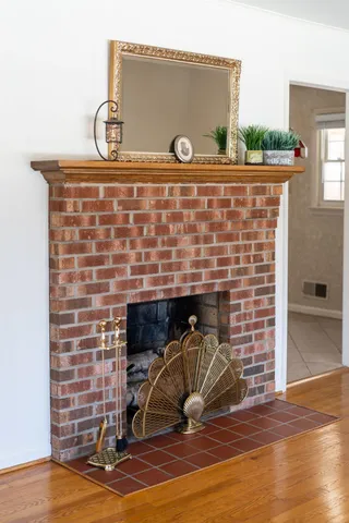 a kitchen with stainless steel appliances a stove a sink and a refrigerator