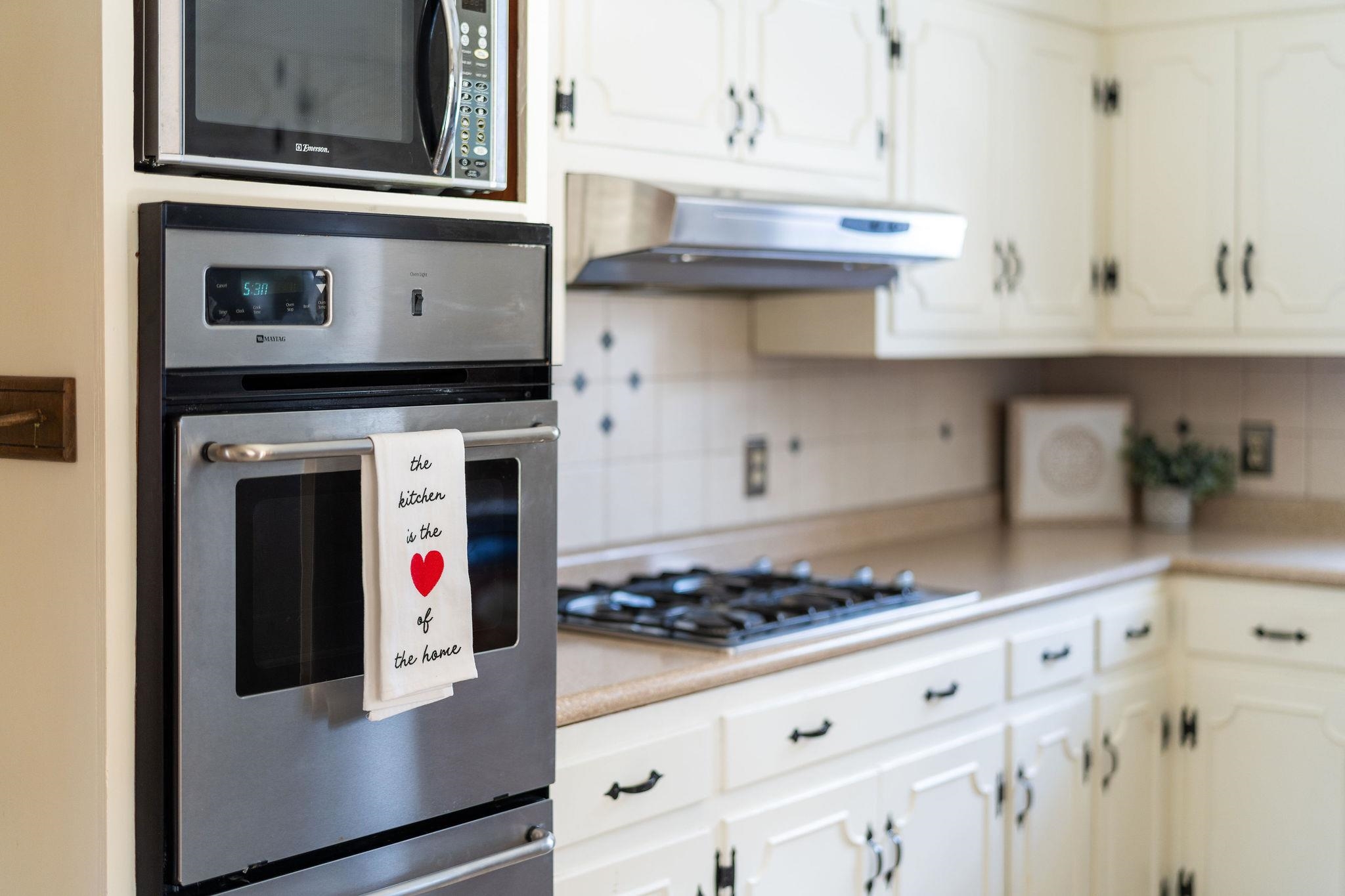 2 McCormick Street Lexington, VA 24450 - Photo 19 of 69 a kitchen with cabinets and appliances