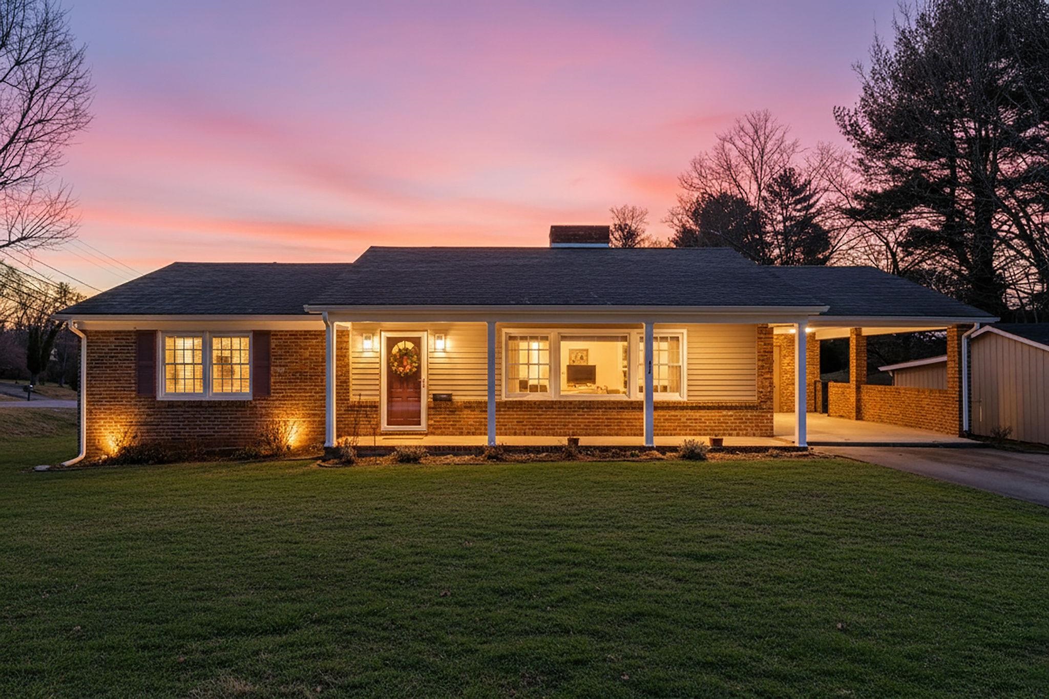 2 McCormick Street Lexington, VA 24450 - Photo 2 of 69 a front view of a house with a yard
