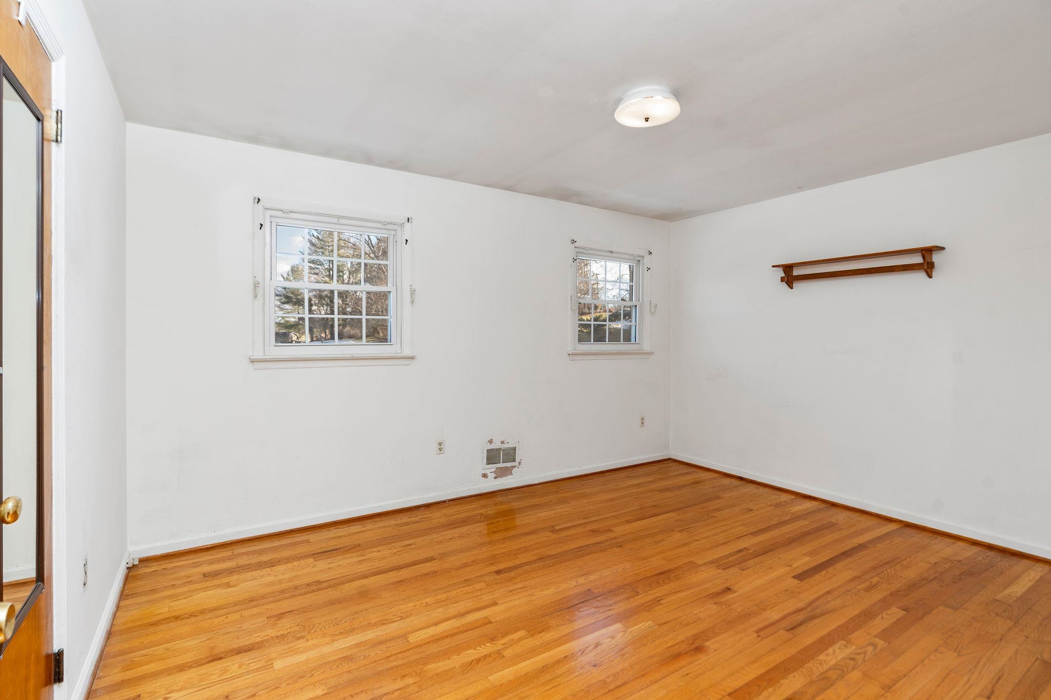 2 McCormick Street Lexington, VA 24450 - Photo 29 of 69 a view of empty room with wooden floor and fan