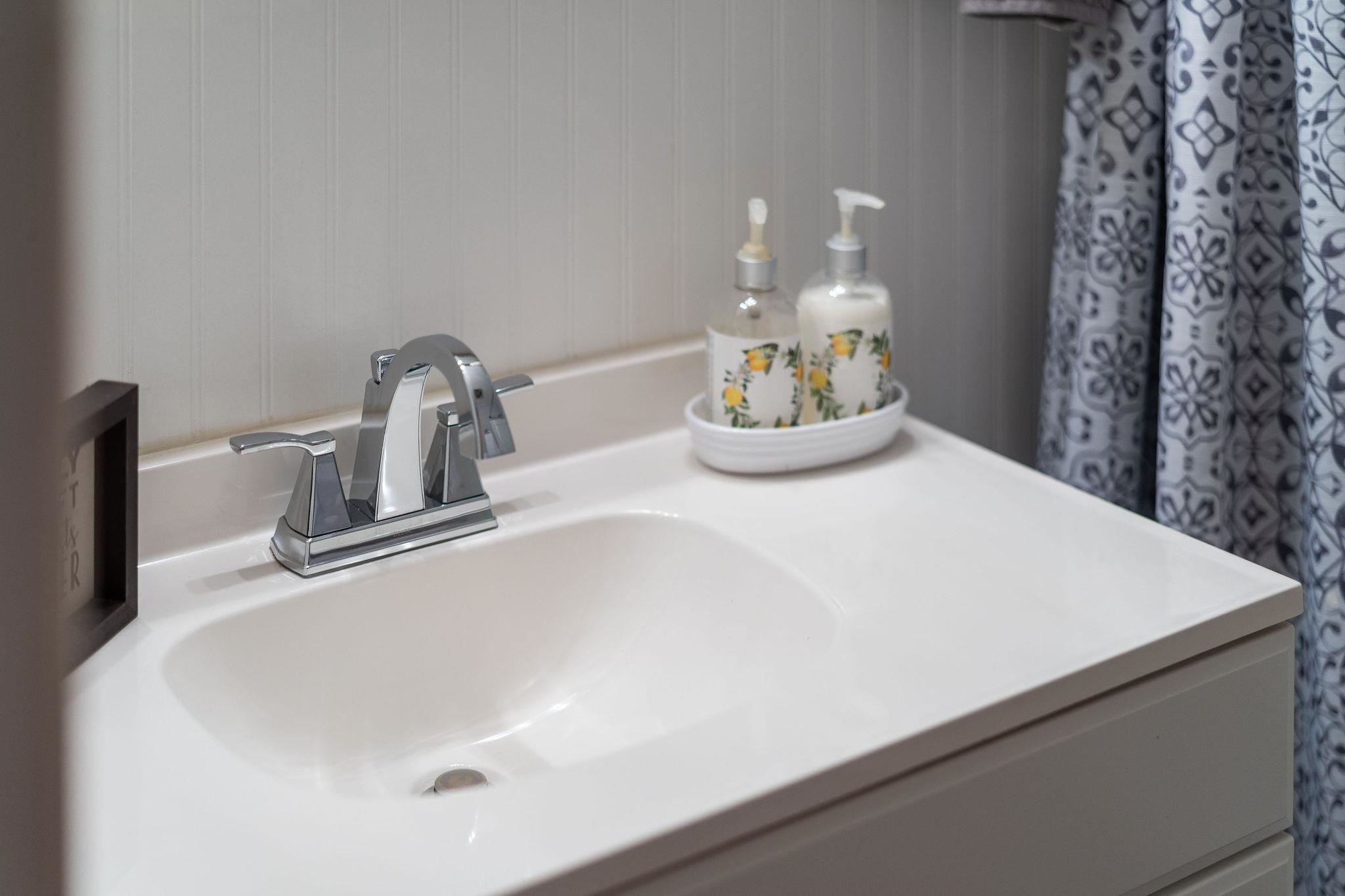 2 McCormick Street Lexington, VA 24450 - Photo 32 of 69 a close view of sink and tap