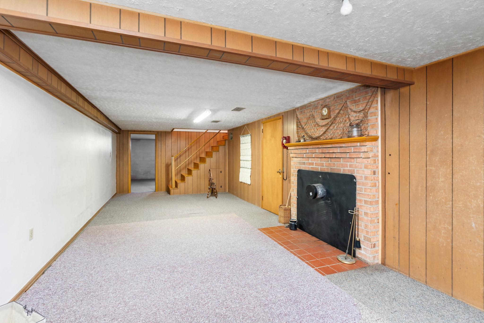 2 McCormick Street Lexington, VA 24450 - Photo 35 of 69 a view of an empty room with a fireplace