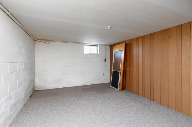 a view of a white house with a outdoor space