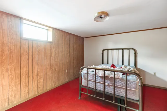 a view of a house with snow on the road