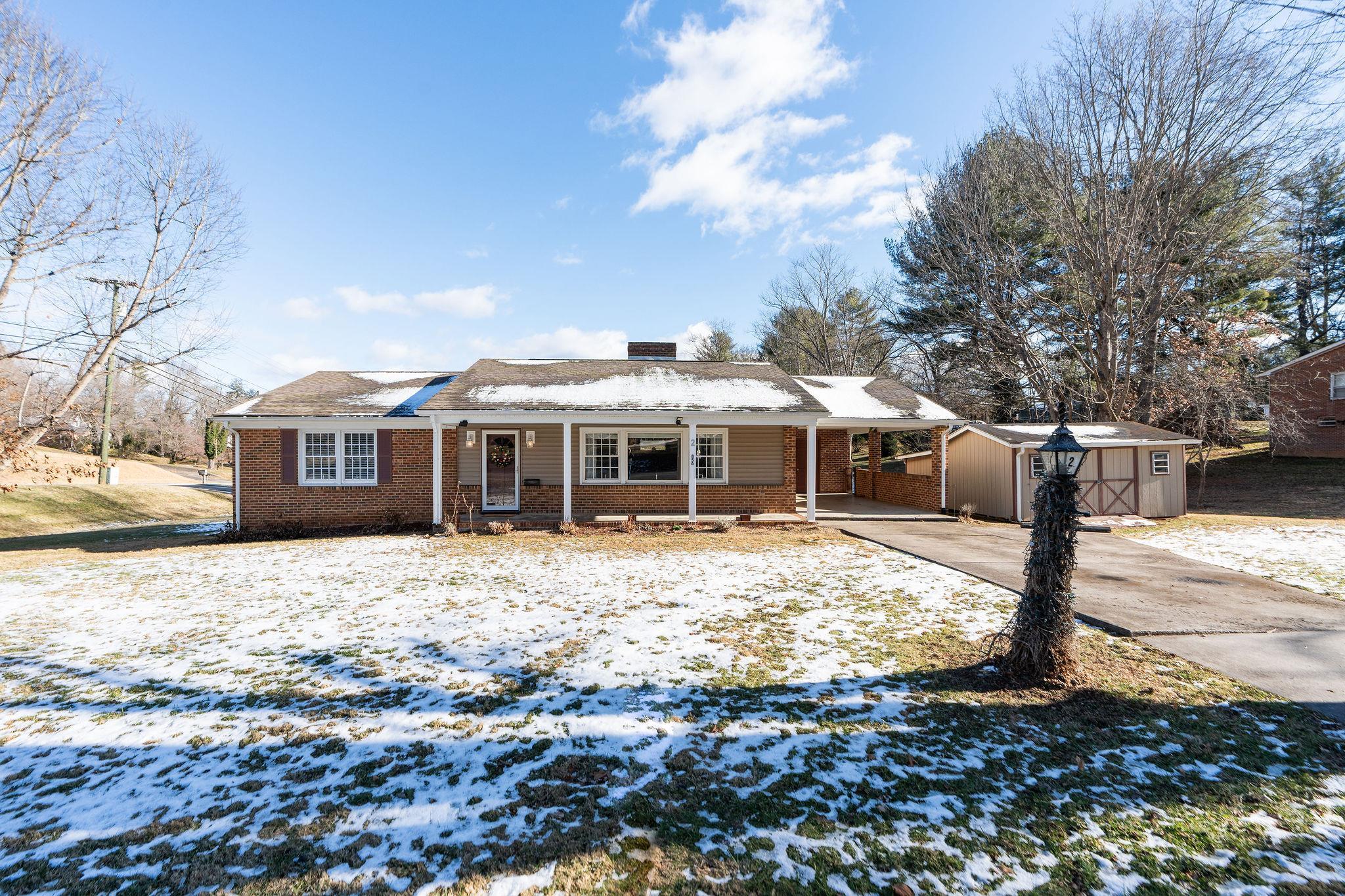 2 McCormick Street Lexington, VA 24450 - Photo 43 of 69 a front view of a house with a yard