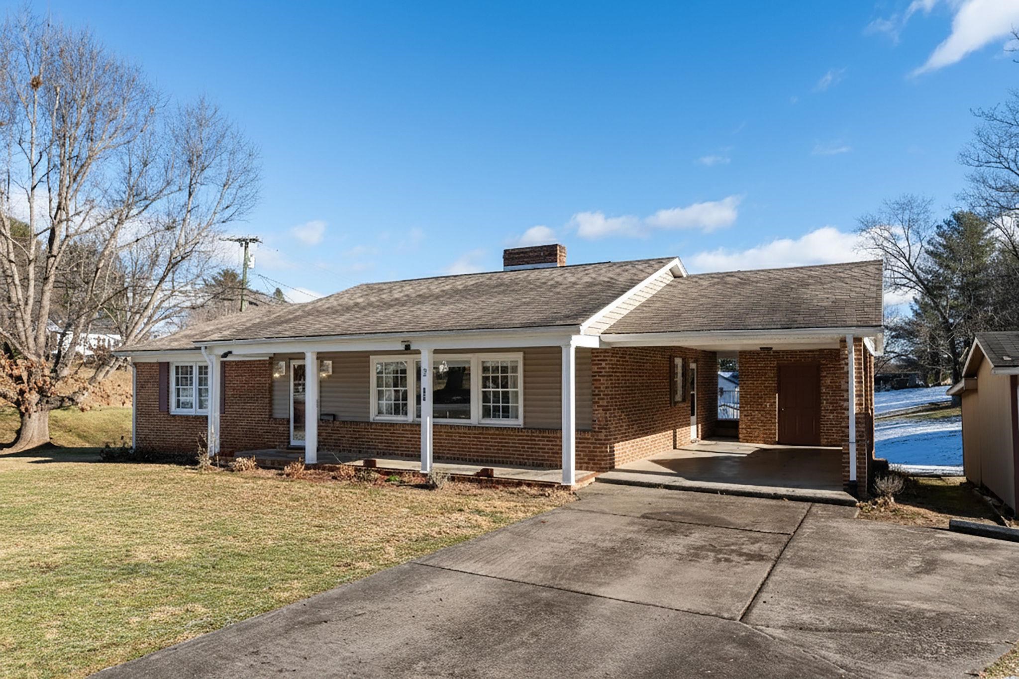 2 McCormick Street Lexington, VA 24450 - Photo 56 of 69 a front view of a house with a patio