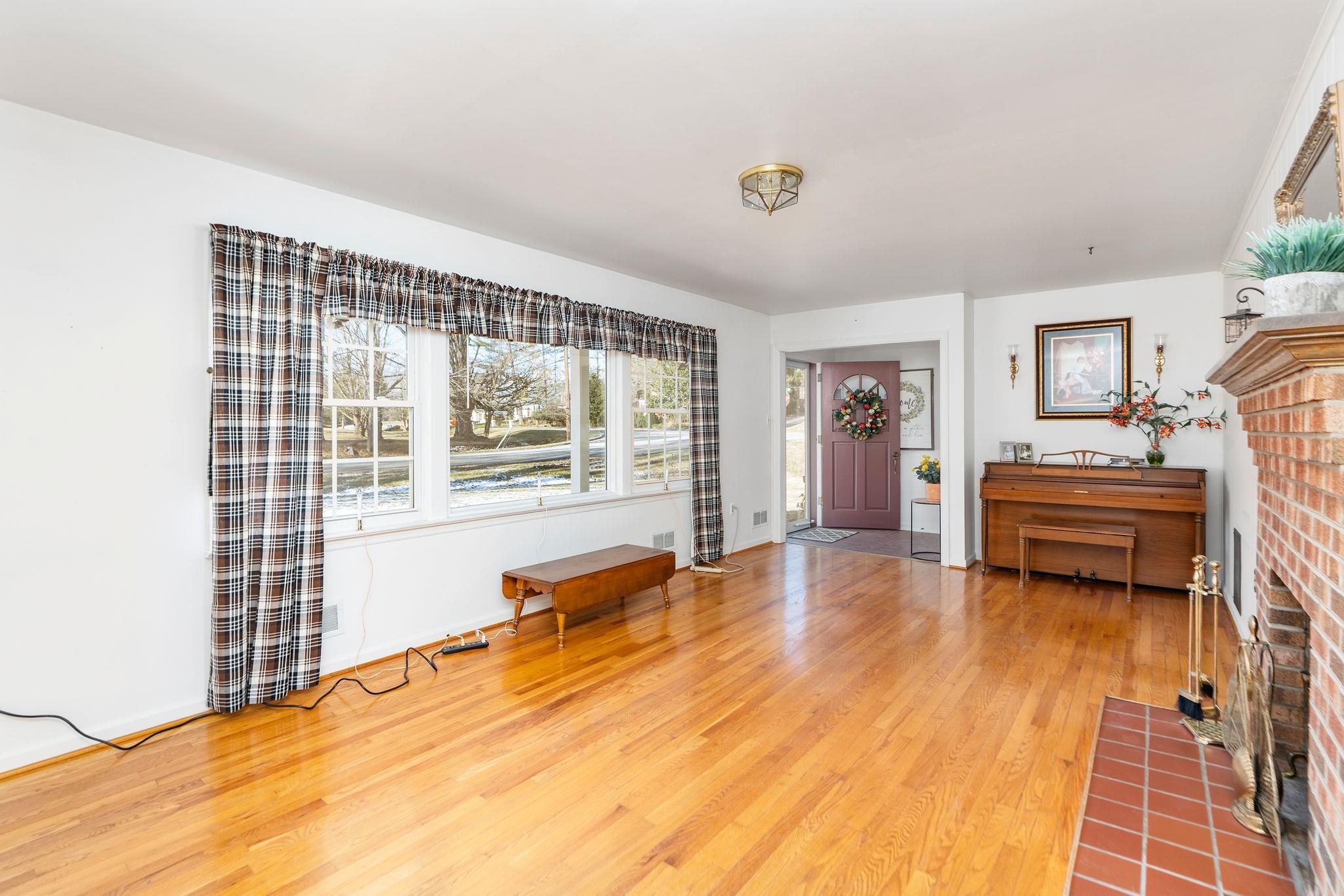 2 McCormick Street Lexington, VA 24450 - Photo 6 of 69 a spacious bedroom with a bed and a window