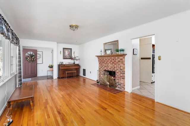 a view of a balcony with wooden floor